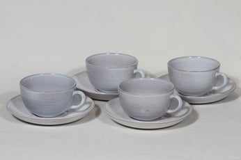 Arabia ARA teekupit, valkoinen lasite, 4 kpl, suunnittelija Michael Schilkin,