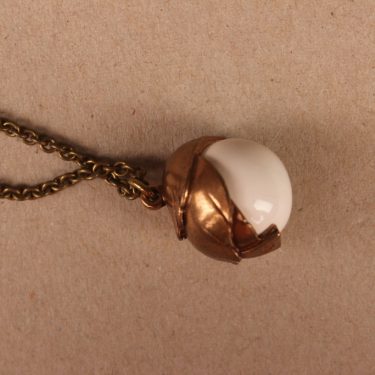 Kalevala Koru Tintti pendant, bronze, necklace